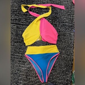 Beach riot - sold together. Never worn. Medium top, small bottoms. Bottom tagged